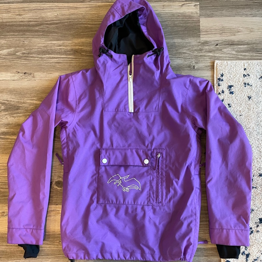 Purple ski/snowboarding jacket.